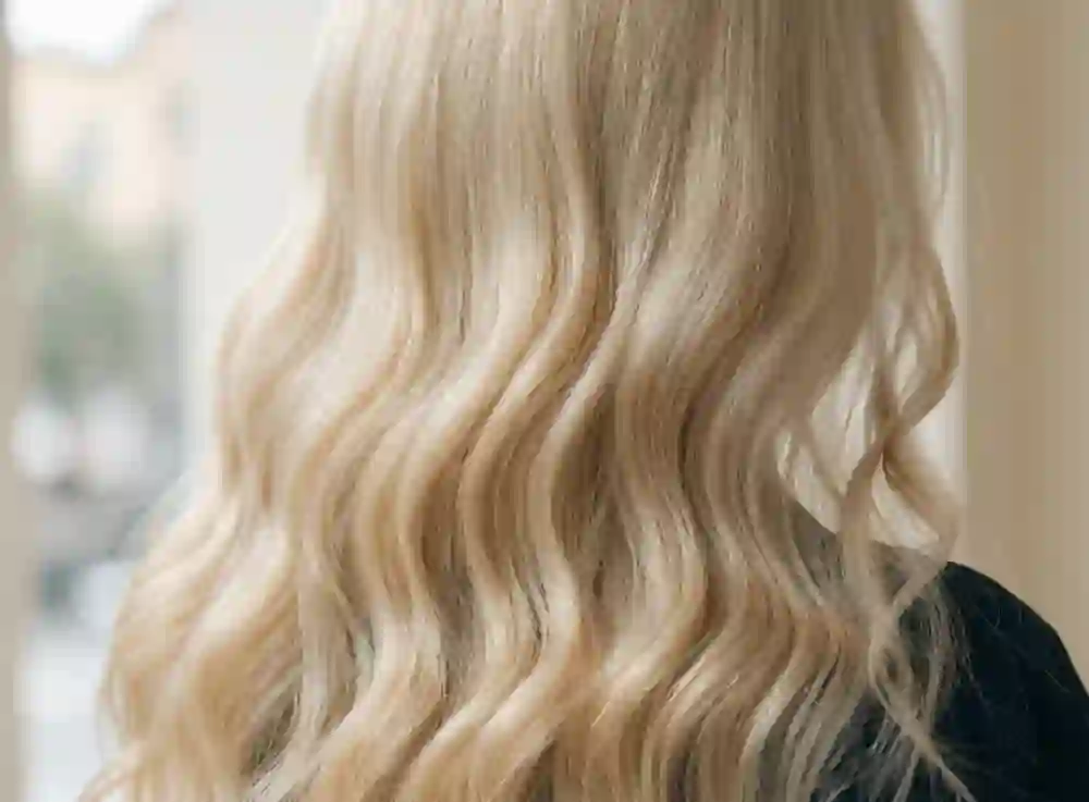 Sample result: corrected bright blonde with soft waves